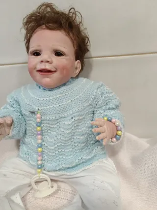 Muñeco bebé reborn con chupete