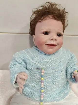 Muñeco bebé reborn con chupete