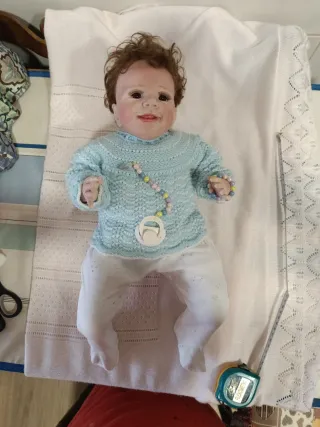 Muñeco bebé reborn con chupete