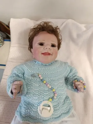 Muñeco bebé reborn con chupete