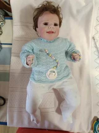Muñeco bebé reborn con chupete