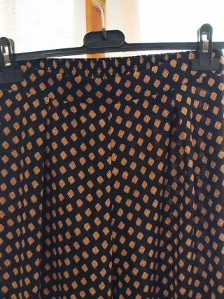 Pantaloni palazzo fantasia geometrica