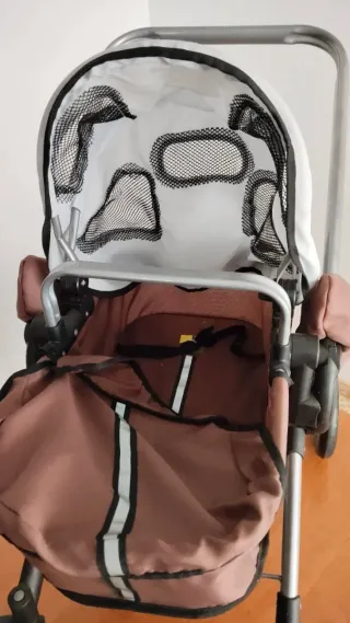 Cochecito para muñecas