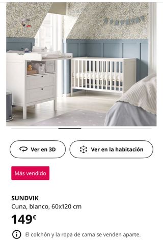 Cuna IKEA con colchón, edredón y sábanas.