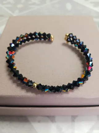 Bracciale rigido Swarovski oro e cristalli neri