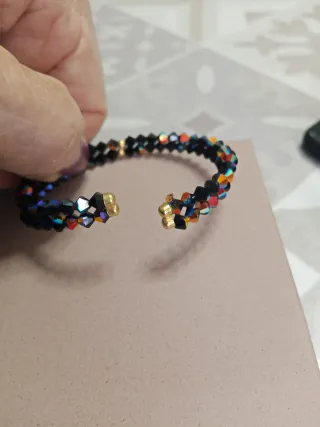Bracciale rigido Swarovski oro e cristalli neri