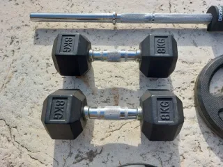 Lote de pesas y barra