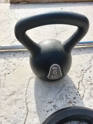 Lote de pesas y barra