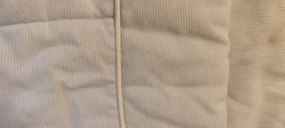 Saco capazo bebé de piqué azul y blanco.