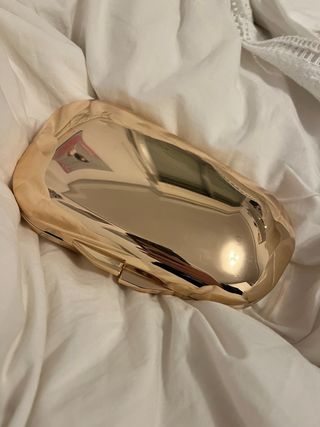 Bolso de fiesta dorado bombonera