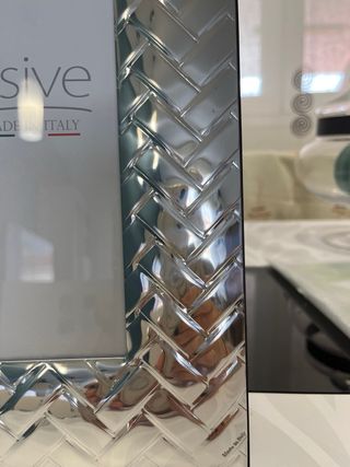 Marco laminado de plata diseño trenzado