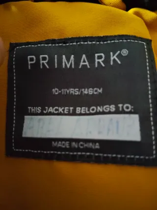 Abrigo niño amarillo con capucha