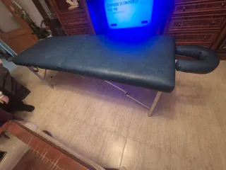 Camilla plegable para dar masajes.