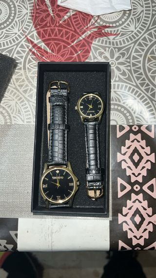 Pareja de relojes con diamante