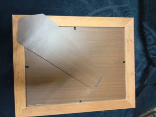 Portafoto in legno con decorazioni in metallo