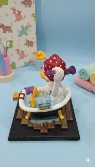 Figura Donald en bañera con patito