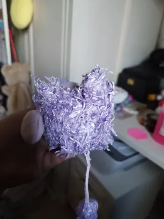 Peluche cane viola con fiocco rosa