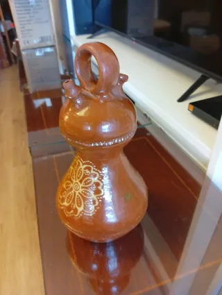 Botijo de barro con dibujos