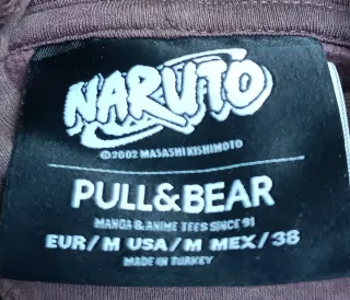 Sudadera marron con estampado de Naruto.