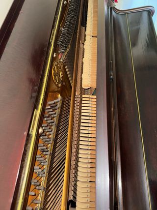 Piano vertical Chassaigne Frères de caoba.