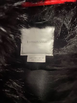 Abrigo efecto piel con pelo