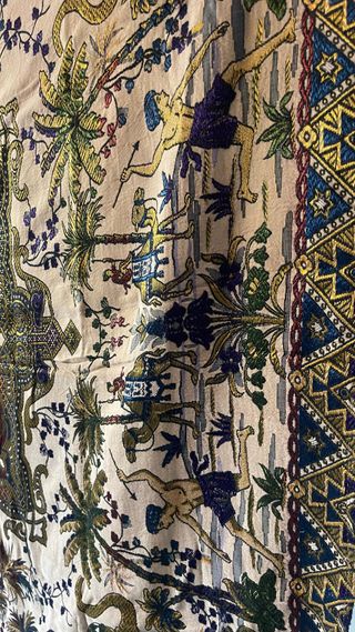 Tela de adorno con diseño de figuras