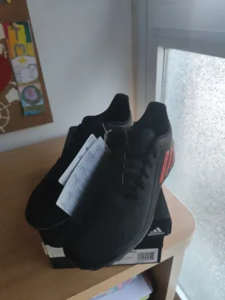 Botas fútbol niño Adidas multitacos negras T3