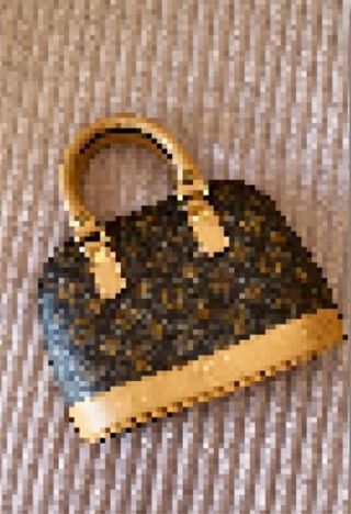 Bolso chic marrón y dorado