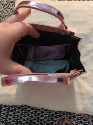 Bolso rosa metalizado efecto piel