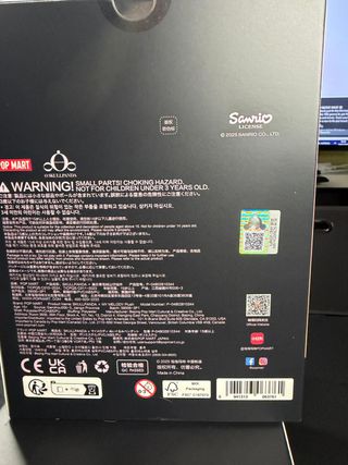 Figura Pop Mart Skullpanda x My Melody Plush