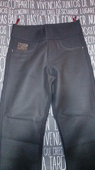 Pantalón elástico negro chica