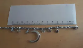 Braccialetto S'agapó con ciondoli luna e stelle