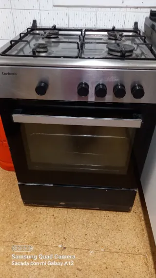 Cocina de gas con horno iasata  de  tortosa