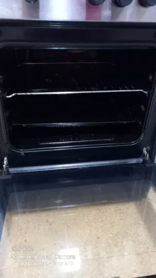 Cocina de gas con horno iasata  de  tortosa