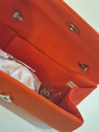 Bolso de mano naranja para eventos