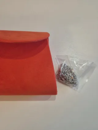 Bolso de mano naranja para eventos