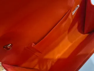 Bolso de mano naranja para eventos