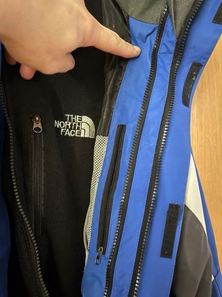 Chaqueta The North Face azul y gris