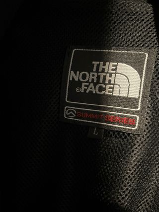 Chaqueta The North Face azul y gris