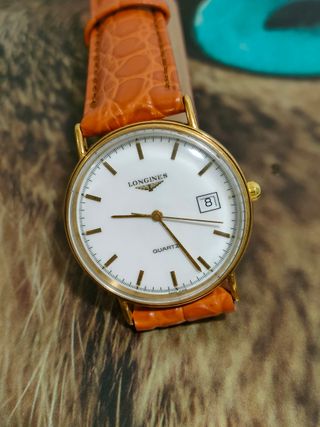 Reloj Longines Dorado y Naranja
