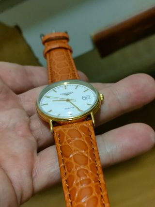 Reloj Longines Dorado y Naranja