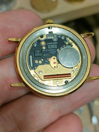 Reloj Longines Dorado y Naranja