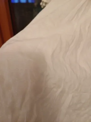 T-shirt bianca con pomponcini