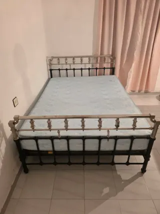 Cama de hierro forjado