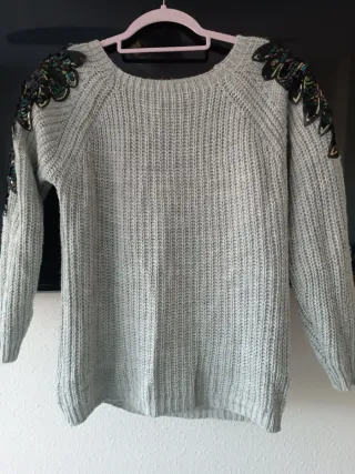 Jersey gris alas lentejuelas