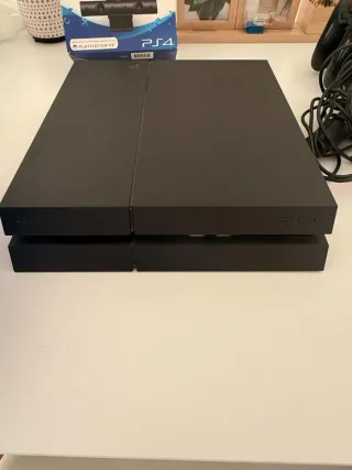 PS4 + 10 Juegos + 2 Mandos + Cámara + Micros