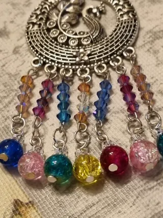 Collana con ciondolo pavone e perline