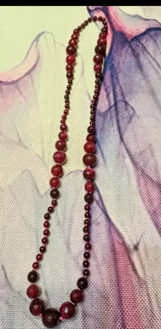 Collana perle colore granato sfaccettate