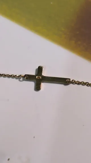 Pulsera plata con baño de oro cruz