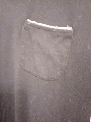 Canotta nera con taschino